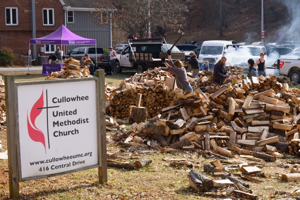 Cullowhee United Methodist Church sign with community firewood distribution event in parking lot